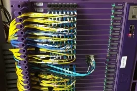 OLT with yellow fiber patch cables