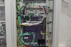Network cabinet with fiber and copper cabling